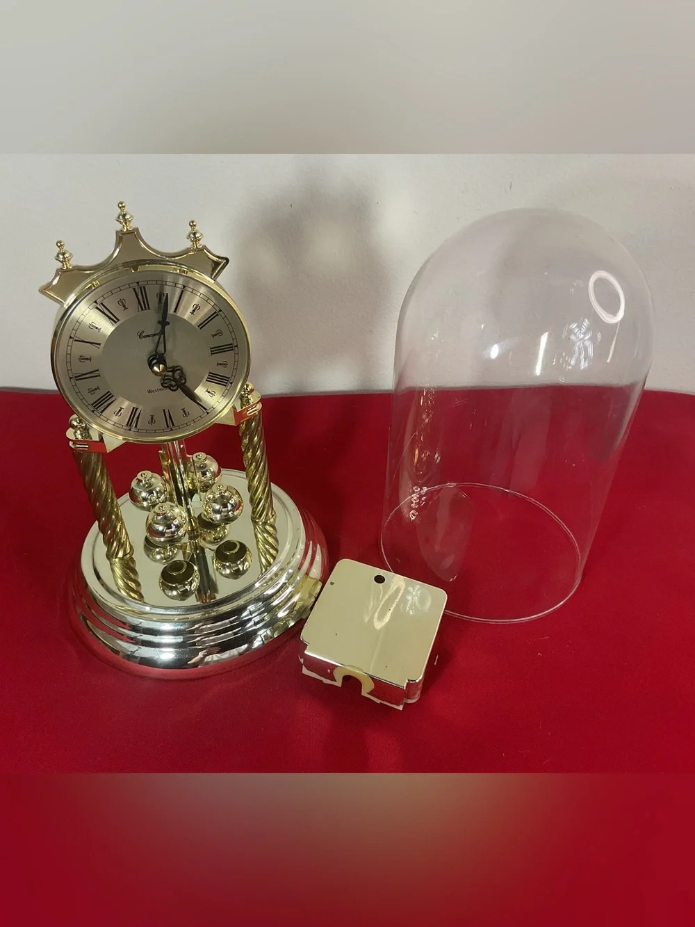 Concordia Anniversary Clock Glass Dome Quartz Rotating Pendulum Mantel Germany….
